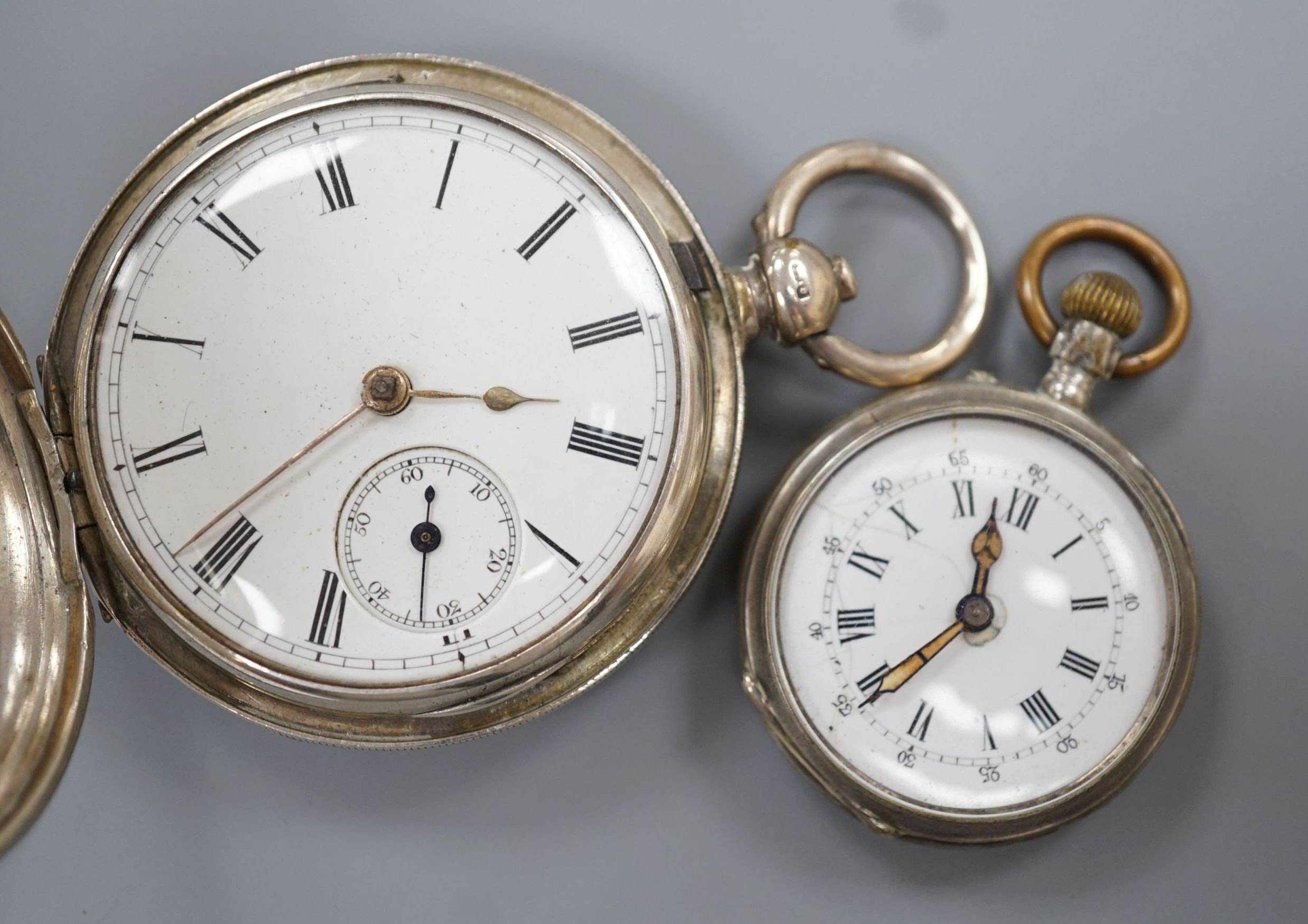 A Victorian silver keywind hunter pocket watch, case diameter 48mm and a white metal open face fob watch.